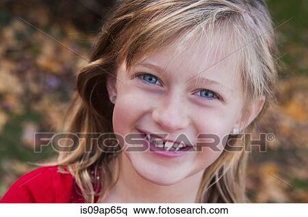 "Portrait of young girl, outdoors, in autumn" View Large Photo Image Stock Photography - "Portrait of young girl, outdoors, in autumn". Fotosearch
