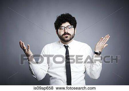 "Portrait of young man, hands open in questioning expression" View Large Photo Image Stock Photo - "Portrait of young man, hands open in questioning expression". Fotosearch