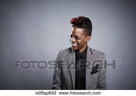 "Portrait of young woman, looking away, smiling" View Large Photo Image Stock Image - "Portrait of young woman, looking away, smiling". Fotosearch