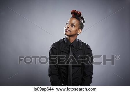 "Portrait of young woman, looking up, smiling" View Large Photo Image Picture - "Portrait of young woman, looking up, smiling". Fotosearch