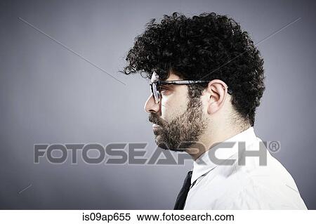 Profile of young man with black curly hair View Large Photo Image Stock Photography - Profile of young man with black curly hair. Fotosearch