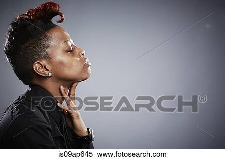 "Profile of young woman, hand under chin" View Large Photo Image Stock Photography - "Profile of young woman, hand under chin". Fotosearch