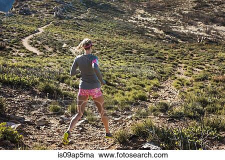 "Rear view of young female trail runner on Pacific Crest Trail, Pine Valley, California, USA" View Large Photo Image Stock Image - "Rear view of young female trail runner on Pacific Crest Trail, Pine Valley, California, USA". Fotosearch