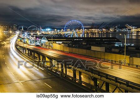 "Road to port and ferris wheel, Seattle, Washington, USA" View Large Photo Image Stock Image - "Road to port and ferris wheel, Seattle, Washington, USA". Fotosearch