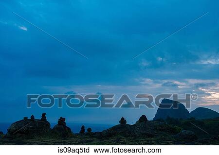 "Silhouetted boulders and stacked rocks, Maui, Hawaii" View Large Photo Image Stock Image - "Silhouetted boulders and stacked rocks, Maui, Hawaii". Fotosearch