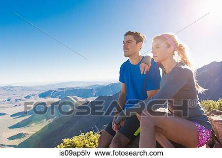 "Trail running couple looking out at landscape on Pacific Crest Trail, Pine Valley, California, USA" View Large Photo Image Stock Photo - "Trail running couple looking out at landscape on Pacific Crest Trail, Pine Valley, California, USA". Fotosearch