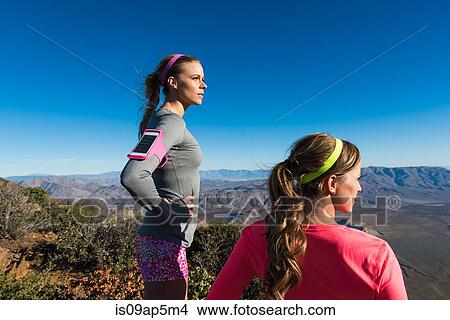 "Two female trail running friends looking at view from Pacific Crest Trail, Pine Valley, California, USA" View Large Photo Image Picture - "Two female trail running friends looking at view from Pacific Crest Trail, Pine Valley, California, USA". Fotosearch