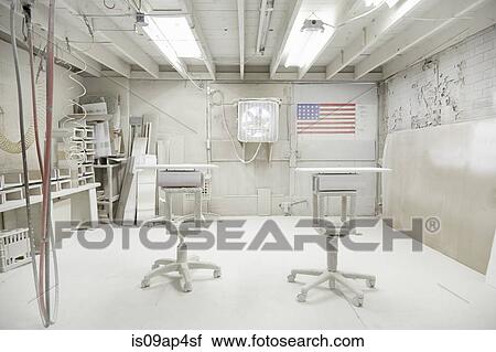 Two wooden blocks on stands in spray booth of cabinet makers workshop View Large Photo Image Stock Image - Two wooden blocks on stands in spray booth of cabinet makers workshop. Fotosearch