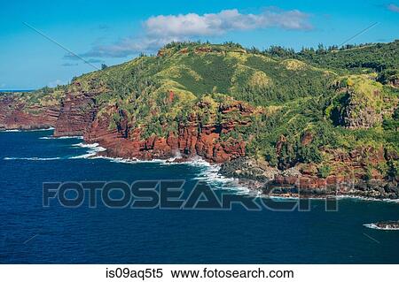"View of sea and red cliffs, North Shore, Maui, Hawaii" View Large Photo Image Stock Photography - "View of sea and red cliffs, North Shore, Maui, Hawaii". Fotosearch