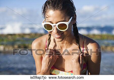 Woman enjoying beach View Large Photo Image Picture - Woman enjoying beach. Fotosearch