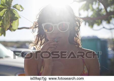 Woman enjoying beach View Large Photo Image Stock Image - Woman enjoying beach. Fotosearch
