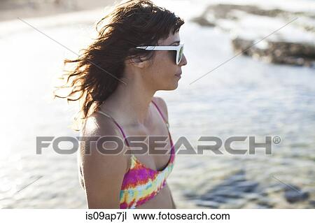 Woman enjoying beach View Large Photo Image Stock Image - Woman enjoying beach. Fotosearch
