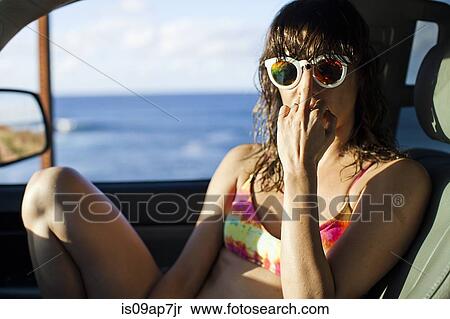 Woman in car by seaside View Large Photo Image Stock Photography - Woman in car by seaside. Fotosearch