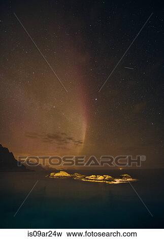 "Aurora borealis disappearing over sea horizon, Reine, Norway" View Large Photo Image Stock Photo - "Aurora borealis disappearing over sea horizon, Reine, Norway". Fotosearch