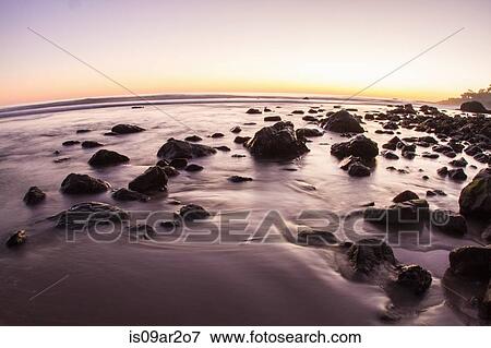 "Beach at sunset, long exposure, California, USA" View Large Photo Image Stock Photo - "Beach at sunset, long exposure, California, USA". Fotosearch