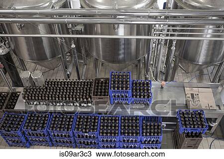 Beer brewery with blue crates of empty bottles View Large Photo Image Stock Image - Beer brewery with blue crates of empty bottles. Fotosearch