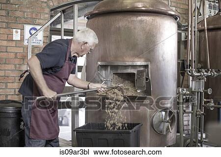 Brewer cleaning a copper kettle in the brewery View Large Photo Image Stock Image - Brewer cleaning a copper kettle in the brewery. Fotosearch