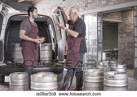 Brewers loading kegs into back of van View Large Photo Image Stock Photo - Brewers loading kegs into back of van. Fotosearch
