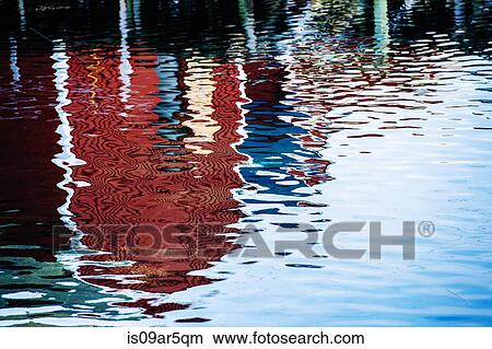 Picture - Buildings reflected in water. Fotosearch