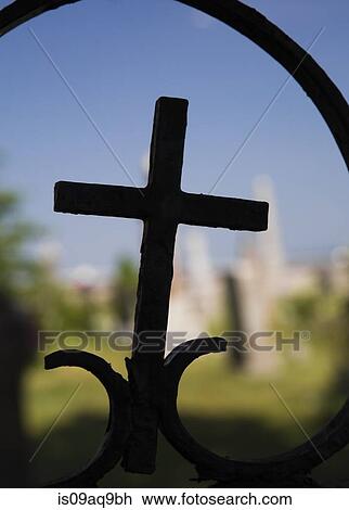 Close up silhouette of cross in front of blue sky View Large Photo Image Stock Image - Close up silhouette of cross in front of blue sky. Fotosearch