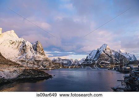 "Coastline and snow-capped mountains, Reine, Norway" View Large Photo Image Stock Photo - "Coastline and snow-capped mountains, Reine, Norway". Fotosearch