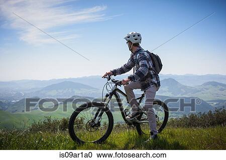 "Cyclist mountain biking, San Luis Obispo, California, United States of America" View Large Photo Image Stock Image - "Cyclist mountain biking, San Luis Obispo, California, United States of America". Fotosearch