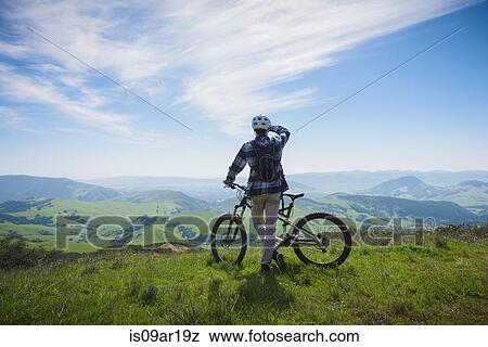 "Cyclist mountain biking, San Luis Obispo, California, United States of America" View Large Photo Image Stock Photo - "Cyclist mountain biking, San Luis Obispo, California, United States of America". Fotosearch