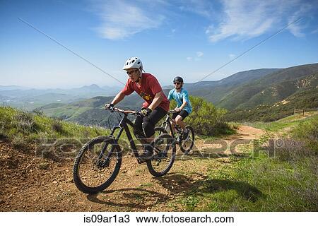 "Cyclists mountain biking, San Luis Obispo, California, United States of America" View Large Photo Image Stock Image - "Cyclists mountain biking, San Luis Obispo, California, United States of America". Fotosearch