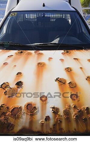 Detail of white car bonnet spotted with rust View Large Photo Image Stock Image - Detail of white car bonnet spotted with rust. Fotosearch