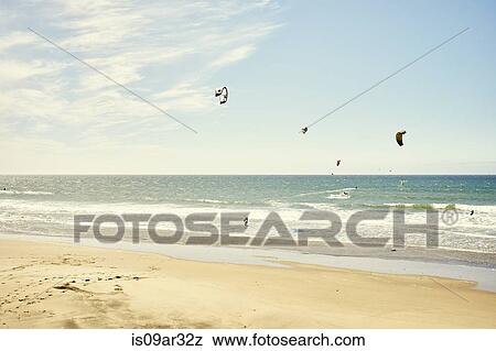 "Distant view of small group of kitesurfers, Pacifica, California, USA" View Large Photo Image Stock Photo - "Distant view of small group of kitesurfers, Pacifica, California, USA". Fotosearch