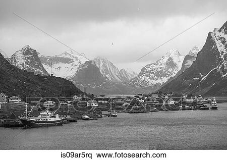 Stock Photography - "Fishing village in black and white, Reine, Lofoten, Norway". Fotosearch
