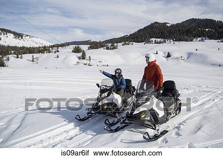 "Friends on snowmobile, Jackson Hole, Wyoming" View Large Photo Image Stock Image - "Friends on snowmobile, Jackson Hole, Wyoming". Fotosearch