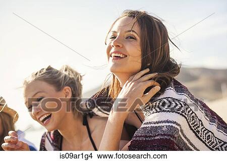 Girlfriends on vacation at beach View Large Photo Image Picture - Girlfriends on vacation at beach. Fotosearch