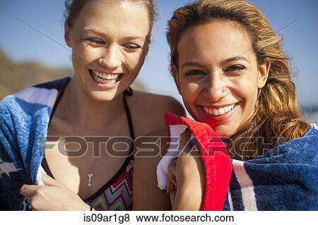 Girlfriends on vacation at beach View Large Photo Image Stock Photo - Girlfriends on vacation at beach. Fotosearch