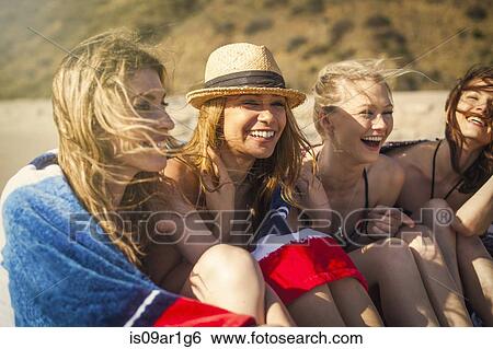 "Girlfriends on vacation at beach, Malibu, California, USA" View Large Photo Image Stock Photograph - "Girlfriends on vacation at beach, Malibu, California, USA". Fotosearch