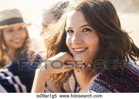 Girlfriends on vacation at beach View Large Photo Image Stock Photography - Girlfriends on vacation at beach. Fotosearch