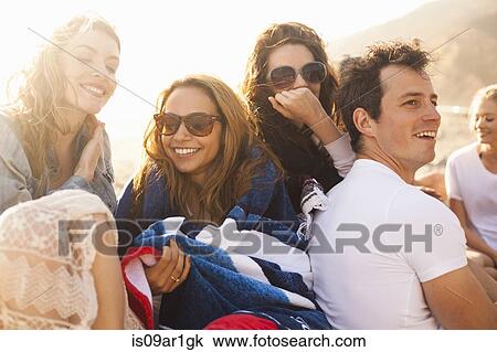 Group of friends camping on beach View Large Photo Image Stock Image - Group of friends camping on beach. Fotosearch