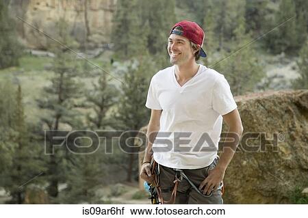 Stock Image - "Happy rock climber, Smith Rock State Park, Oregon". Fotosearch