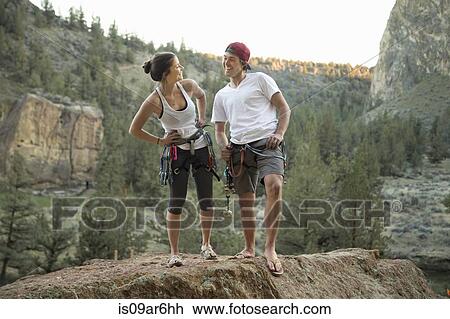 Stock Image - "Happy rock climbers posing, Smith Rock State Park, Oregon". Fotosearch