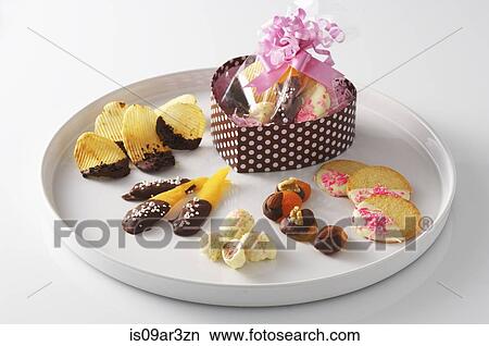 Heart shape gift box and confectionery View Large Photo Image Picture - Heart shape gift box and confectionery. Fotosearch