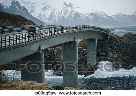 "Off road vehicle crossing coastal bridge, Reine, Lofoten, Norway" View Large Photo Image Stock Photo - "Off road vehicle crossing coastal bridge, Reine, Lofoten, Norway". Fotosearch