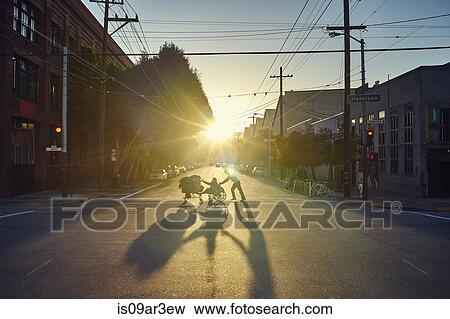 "People crossing road at sunset, San Francisco, California, USA" View Large Photo Image Stock Photo - "People crossing road at sunset, San Francisco, California, USA". Fotosearch