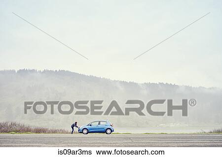 "Person leaning on car, Trinidad, California, USA" View Large Photo Image Stock Photograph - "Person leaning on car, Trinidad, California, USA". Fotosearch