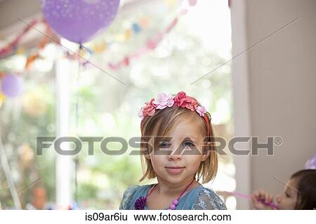 Portrait of blonde girl with flower headband smiling at camera View Large Photo Image Stock Photograph - Portrait of blonde girl with flower headband smiling at camera. Fotosearch