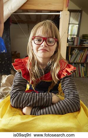 Stock Image - Portrait of young girl in fancy dress costume. Fotosearch