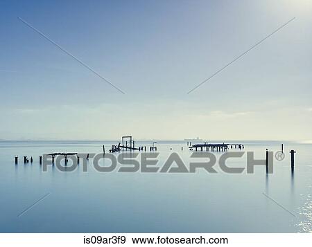 Stock Photo - "Remains of old pier at San Francisco bay, San Francisco, California, USA". Fotosearch