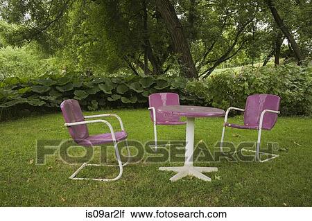 Retro table and chairs in garden View Large Photo Image Stock Image - Retro table and chairs in garden. Fotosearch