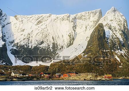 Stock Image - "Snow capped mountains, Reine, Lofoten, Norway". Fotosearch