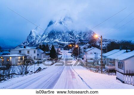 "Snow covered road through at dusk, Reine, Lofoten, Norway" View Large Photo Image Stock Image - "Snow covered road through at dusk, Reine, Lofoten, Norway". Fotosearch