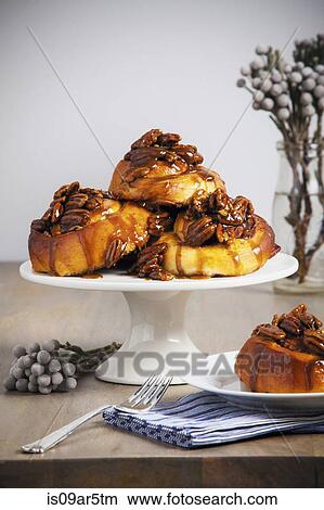 Sticky buns on cake stand View Large Photo Image Picture - Sticky buns on cake stand. Fotosearch